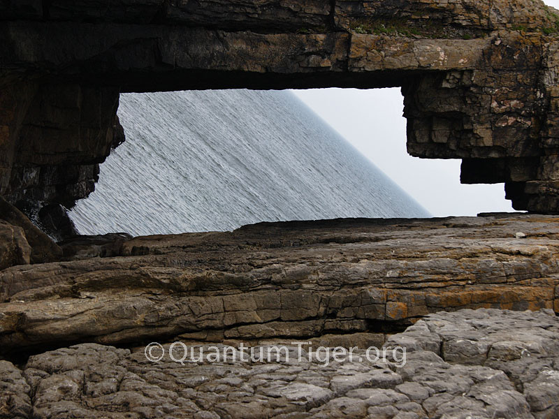 A natural rock archway on the Worms Head.